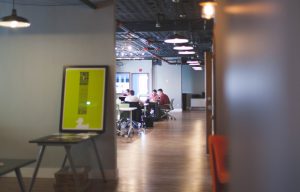 people working in an open space office