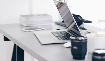 laptop on a grey desk